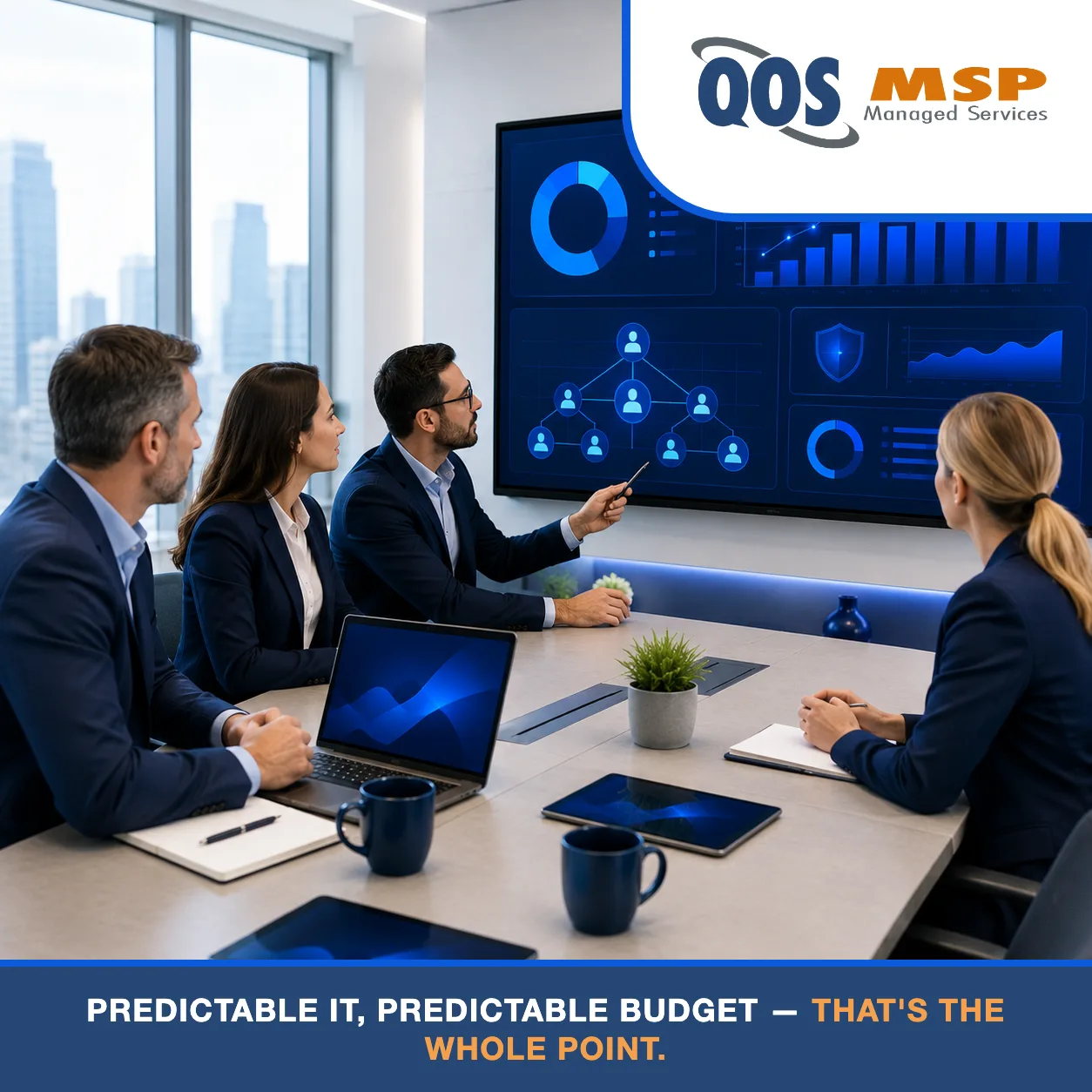 Executives reviewing IT budget dashboards in a conference room